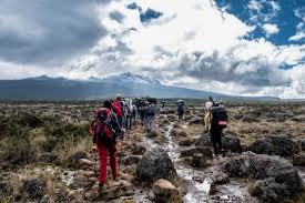 A challenging hike on a rocky trail, representing Ol Donyo Orok